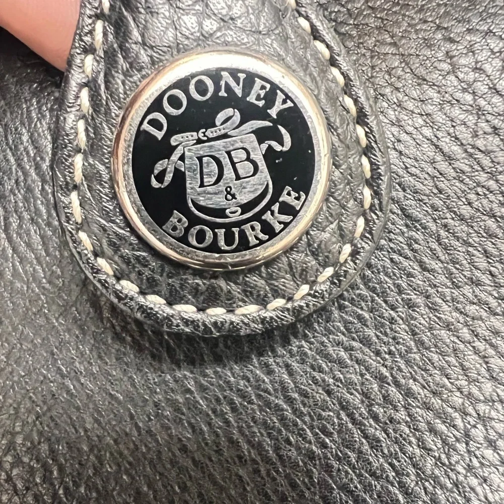 Pristine Condition Dooney and Bourke Pebble Grain Leather Black Backpack